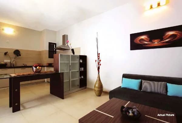 Shri Radha NRI Greens — Sample Bedroom